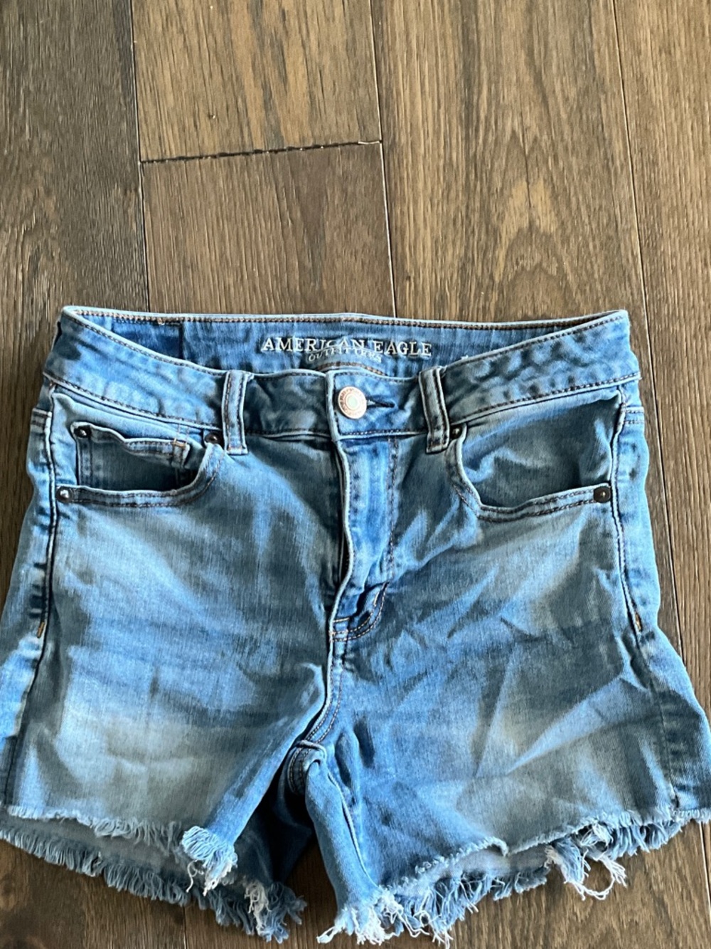 American Eagle Outfitters Light Blue Denim Shorts with Frayed Hem